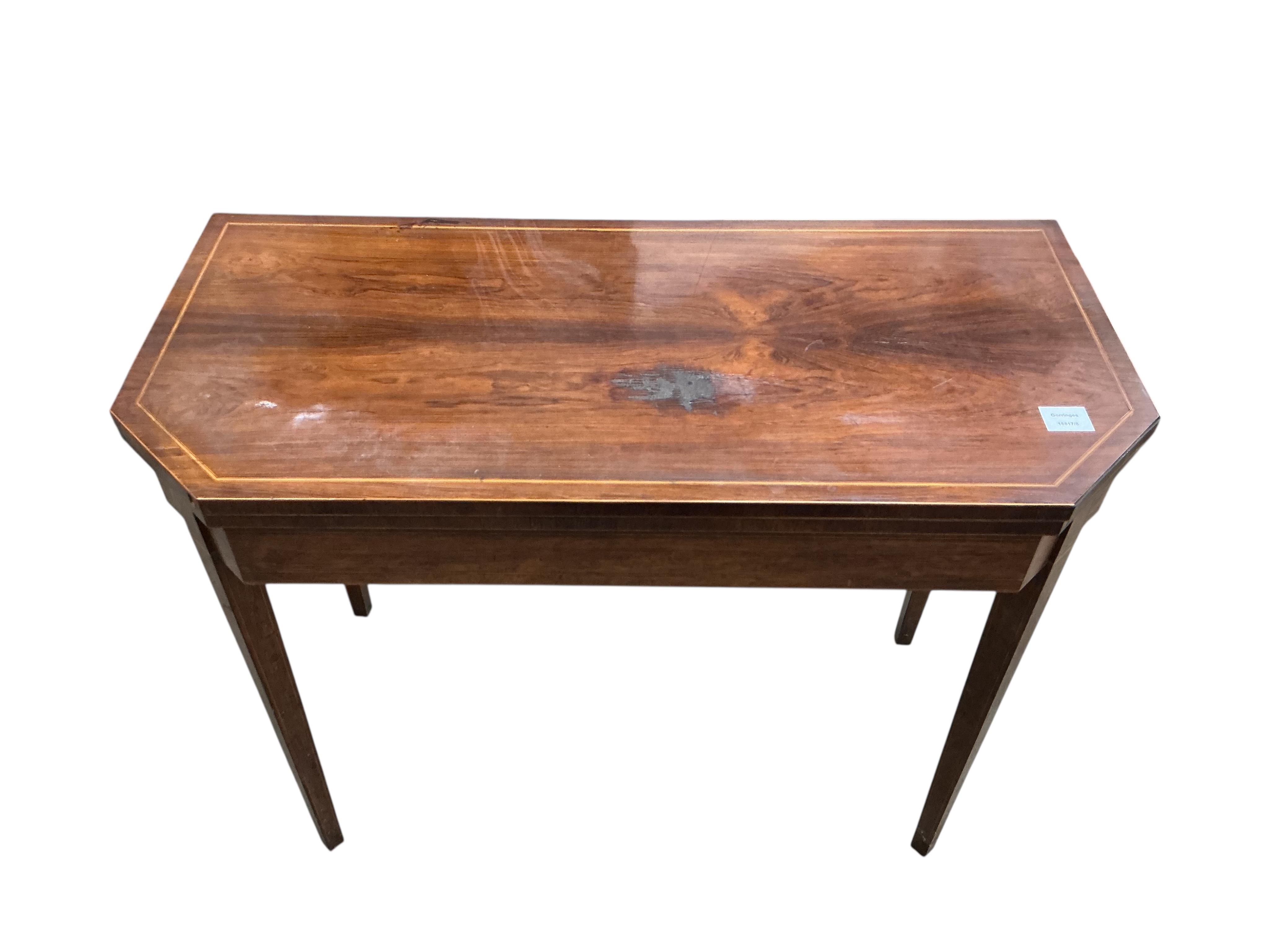 A George III inlaid banded rosewood folding tea table, width 91cm, depth 43cm, height 74cm